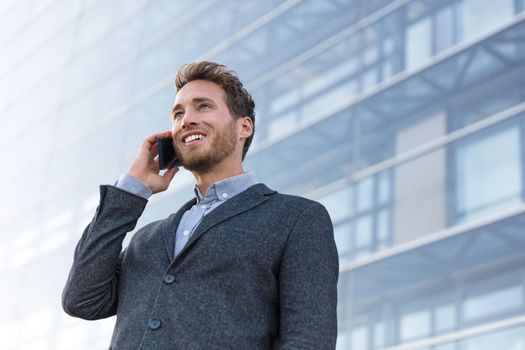 Man professional talking on phone calling business partner. Businessman real estate agent or lawyer having negotiation conversation in modern city background.
