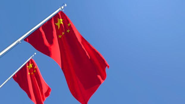 3D rendering of the national flag of China waving in the wind against a blue sky