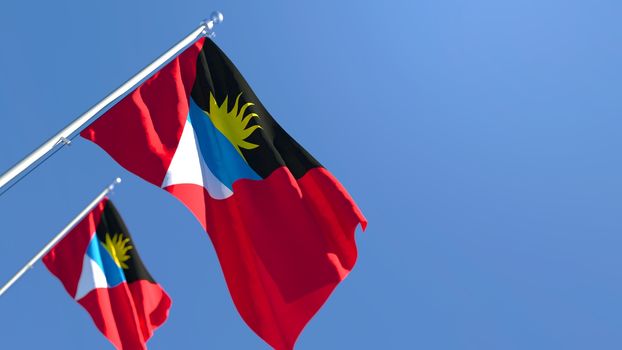 3D rendering of the national flag of Barbuda waving in the wind against a blue sky