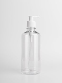 Blank Mockup plastic transparent bottle with dispenser airless pump using label and ads for Gel,soap,Alcohol,cream and cosmetics.