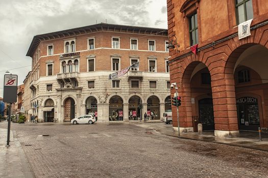 FERRARA, ITALY 29 JULY 2020 : Buildings in crossroads in Ferrara in Italy