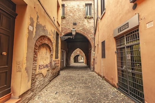 FERRARA, ITALY 29 JULY 2020 : Via delle Volte in Ferrara in Italy a famous alley in the Historical italian city