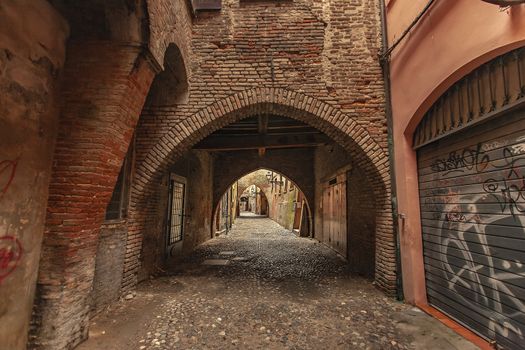 FERRARA, ITALY 29 JULY 2020 : Via delle Volte in Ferrara in Italy a famous alley in the Historical italian city