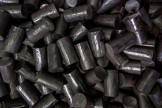 sawed round hot-rolled steel billets made of long products with circle intersection - abstract dark industrial background