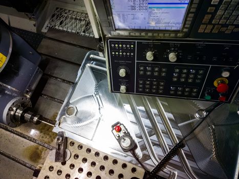 Measuring process with ruby touch probe on large CNC milling machine in jog mode.