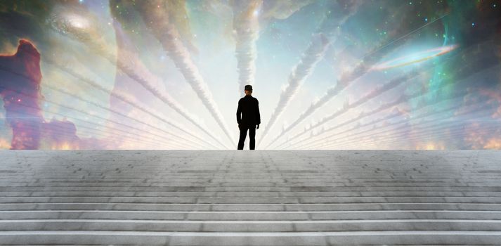 Man in black suit. Colorful sky with surreal clouds and galaxy