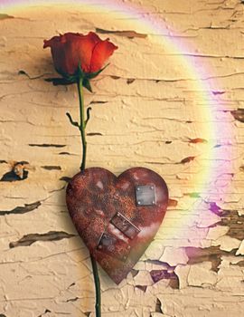 Surrealism. Red rose and rusted heart with metal patches. Rainbow.