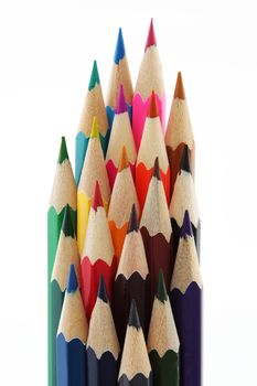 A group of multi colored pencils isolated on white background