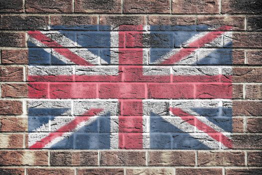 A United Kingdom Great Britain union jack flag on brick wall background