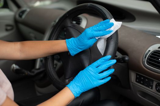 Cleaning car enterier wit antibacterial wet wipes
