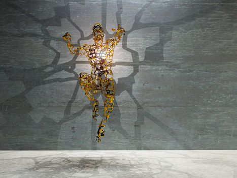 Men's figure made of gold with light rays