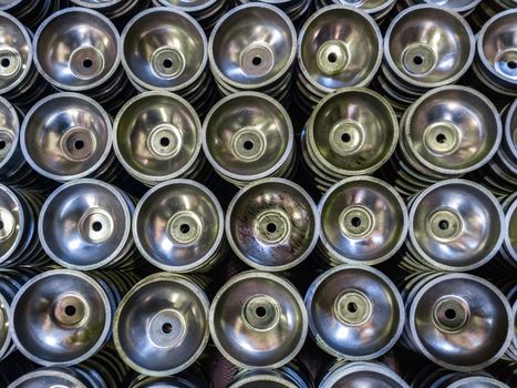 batch of thick alluminium stamped half-spherical parts.