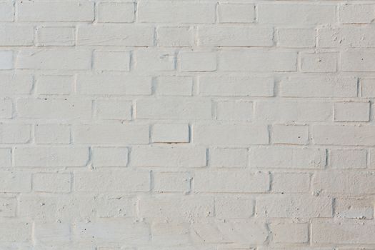 whitewash brick wall horizontal background with side sunlight