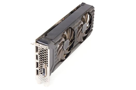 Used and dusty black PC video card isolated on white background.