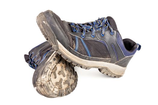 dirty used worn out black and blue outdoor empty clean lightweight waterproof sneakers isolated on white background