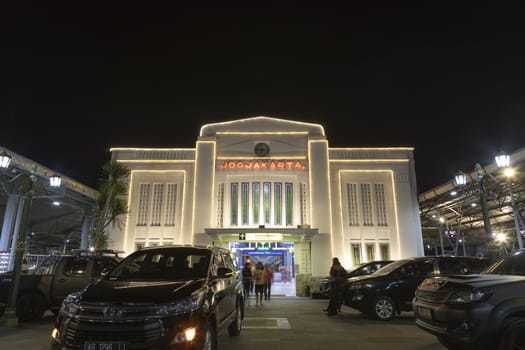 Jogjakarta, Special Region of Jogjakarta, Indonesia - July 16, 2019: Main side entrance to the ticket checking area of Jogjakarta central train station at night.