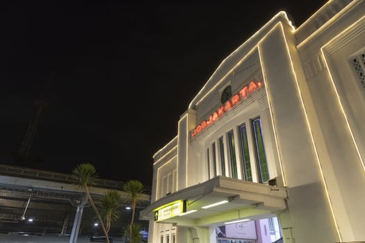 Jogjakarta, Special Region of Jogjakarta, Indonesia - July 16, 2019: Main side entrance to the ticket checking area of Jogjakarta central train station at night.