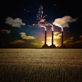 Surrealism. Naked man with wings in US national colors flies above field of wheat. Factory at the horizon