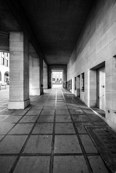 Stone hallway angle shot with tiled floor