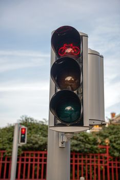 Closeup photo of some traffic lights showing red