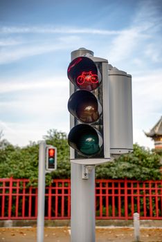 Closeup photo of some traffic lights showing red