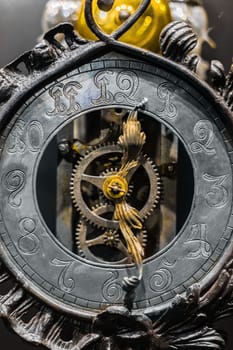 Old clock closeup made out of steel and metal