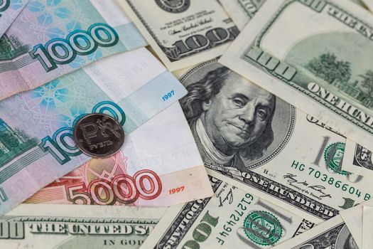 russian rubles and us dollars close-up background with selective focus and blur