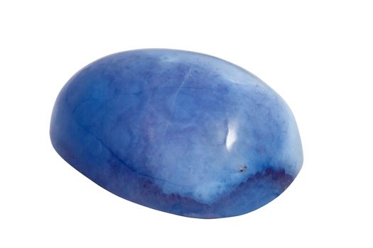 A piece of blue polished agate isolated on white background with selective focus and blur