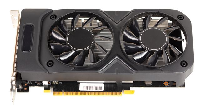 Used and dusty black PC video card isolated on white background.