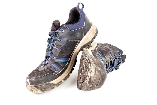 dirty used worn out black and blue outdoor empty clean lightweight waterproof sneakers isolated on white background