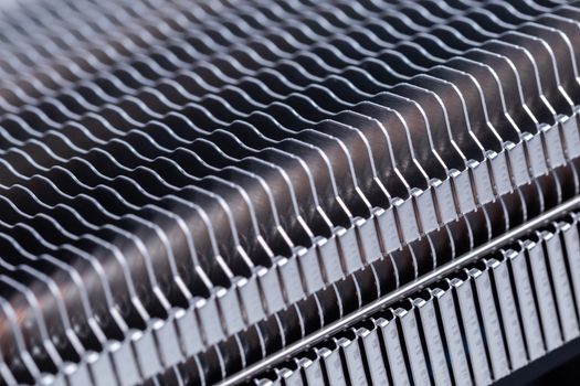 large desktop pc tower type heat radiator unit closeup macro background with selective focus, blur and diagonal composition