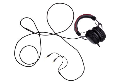 wired black gaming headset with whole wire isolated on white background in flat lay composition top-down