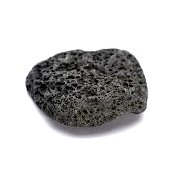 Black strange rock isolated on white closeup