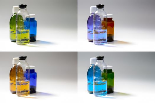 set of colored medial bottles on gray background with copyspace.
