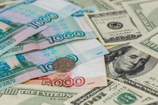 russian rubl and us dollar close-up background with selective focus.