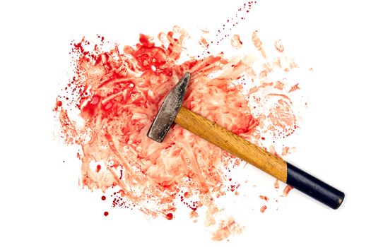 old hammer on human blood splatter isolated on white background in flat lay top-down perspective.