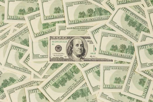 one hundred us dollar banknotes flat background with central composition