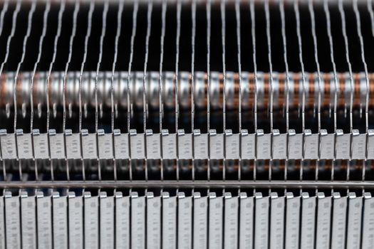 modern heat radiator closeup macro background with selective focus and blur