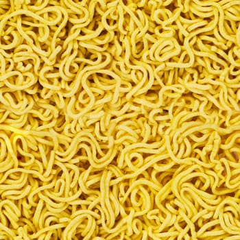 uncooked instant noodles seamless texture in natural color .