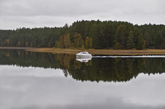 A boat on a lake in the city of Kuhmo, Finland.