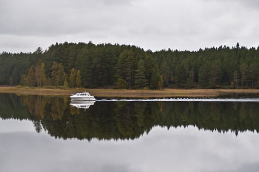 A boat on a lake in the city of Kuhmo, Finland.