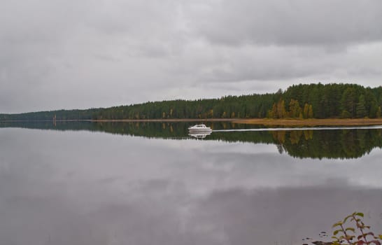 A boat on a lake in the city of Kuhmo, Finland.