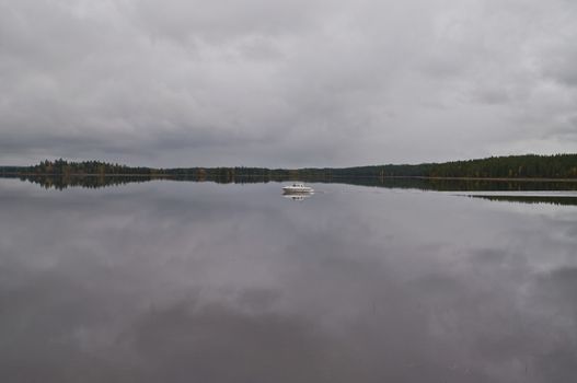 A boat on a lake in the city of Kuhmo, Finland.