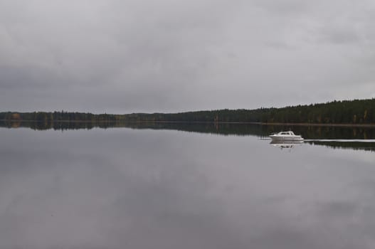 A boat on a lake in the city of Kuhmo, Finland.