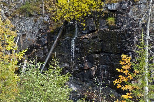 Small water fall in a national park in East-Finland