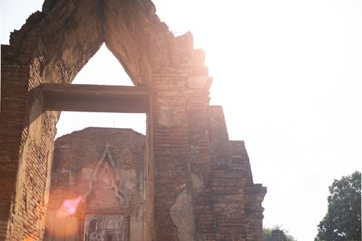 Sunset light shots and ancient temple door architecture in Thailand