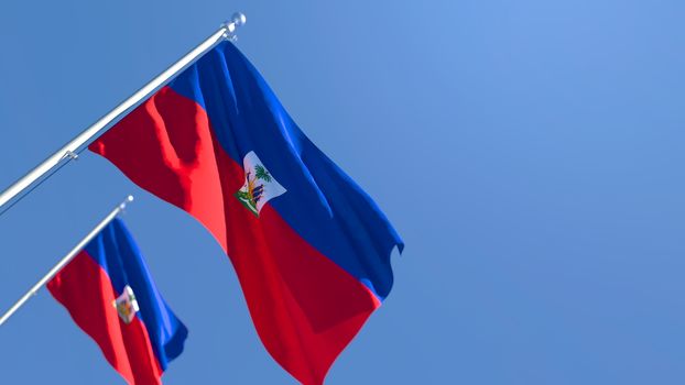 3D rendering of the national flag of Haiti waving in the wind against a blue sky
