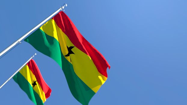 3D rendering of the national flag of Ghana waving in the wind against a blue sky