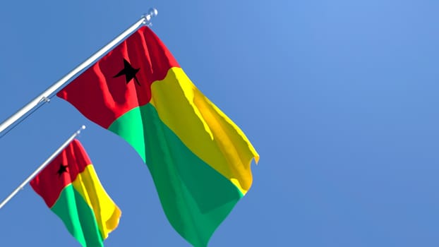3D rendering of the national flag of Guinea Bissau waving in the wind against a blue sky