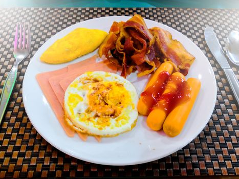 top view of breakfast on table with fork and spoon